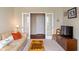 Inviting living room with double doors, comfortable seating, and a decorative trunk at 52 E 286Th St, Atlanta, IN 46031