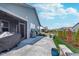 Backyard features a patio with built in outdoor kitchen, landscaping, and fence at 5218 Pinehurst Ct, Whitestown, IN 46075