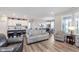 Spacious living area blending into the kitchen and dining room, perfect for entertaining at 5218 Pinehurst Ct, Whitestown, IN 46075