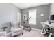 This office features great natural light, chair rail, neutral paint, and an exercise bike at 5218 Pinehurst Ct, Whitestown, IN 46075