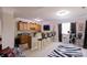 Finished basement with a full bar and seating, complete with modern black bar stools at 5251 Ladywood Bluff Pl, Indianapolis, IN 46226