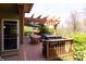 Outdoor deck featuring a BBQ grill and a covered dining space at 5251 Ladywood Bluff Pl, Indianapolis, IN 46226