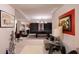 Basement game room featuring a ping pong table and seating area with zebra print accents at 5251 Ladywood Bluff Pl, Indianapolis, IN 46226