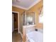 The bathroom features a standing glass shower and decorative vases on the marble ledge at 5251 Ladywood Bluff Pl, Indianapolis, IN 46226