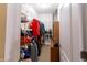 Organized walk-in closet with shelving and hanging space for optimal storage solutions at 5251 Ladywood Bluff Pl, Indianapolis, IN 46226
