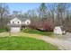 Aerial view of the home with a well-manicured lawn at 5307 S State Road 135, Morgantown, IN 46160