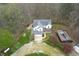 Aerial view of a house, a pool, and trees at 5307 S State Road 135, Morgantown, IN 46160