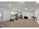 Basement featuring white walls, carpet flooring, a window, and gym equipment at 5307 S State Road 135, Morgantown, IN 46160