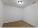 Cozy bedroom features neutral carpeting and a modern ceiling light at 5307 S State Road 135, Morgantown, IN 46160