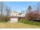 Charming two-story home with a brick facade, two-car garage, and a welcoming front porch at 5307 S State Road 135, Morgantown, IN 46160