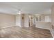 Spacious living area with ceiling fan and view of hallway and other rooms at 5307 S State Road 135, Morgantown, IN 46160