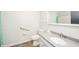 Updated bathroom with new vanity, sink, and ADA compliant grab bar at 5576 N Heritage Ln, Alexandria, IN 46001
