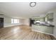 Bright, airy living room featuring light wood floors and plenty of natural light at 5576 N Heritage Ln, Alexandria, IN 46001