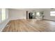 Spacious living room featuring new floors with an open layout to the kitchen at 5576 N Heritage Ln, Alexandria, IN 46001