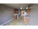 An efficient kitchen with light wood cabinets and white appliances in a compact space at 5609 Sweet River Dr, Indianapolis, IN 46221