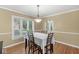 Charming dining room with natural light and hardwood floors at 5747 Allisonville Rd, Indianapolis, IN 46220