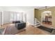 Living room with hardwood floors and easy access to dining area at 5747 Allisonville Rd, Indianapolis, IN 46220