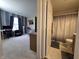 Bright bedroom flows into well-lit bathroom, offering seamless transition and convenience at 5848 Jackie Ln, Indianapolis, IN 46221
