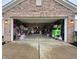 Spacious garage provides ample storage and workspace, ideal for hobbies and projects at 5848 Jackie Ln, Indianapolis, IN 46221