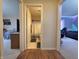 Hallway view reveals bedroom on right, bathroom in center, enhancing flow and privacy at 5848 Jackie Ln, Indianapolis, IN 46221