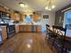 Well-appointed kitchen with stainless steel appliances and a dining area at 5848 Jackie Ln, Indianapolis, IN 46221