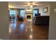 Cozy living room with wood floors, fireplace, and abundant natural light at 5848 Jackie Ln, Indianapolis, IN 46221