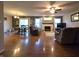Spacious living room with hardwood flooring, fireplace, and adjacent dining area at 5848 Jackie Ln, Indianapolis, IN 46221
