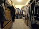 Spacious walk-in closet with ample storage solutions, offering a functional space at 5848 Jackie Ln, Indianapolis, IN 46221