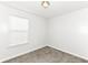 Neutral bedroom with carpet flooring, a window, and neutral walls at 5855 La Fleur Ct, Indianapolis, IN 46237