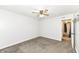 This bedroom has carpet flooring, neutral walls, a ceiling fan and closet at 5855 La Fleur Ct, Indianapolis, IN 46237