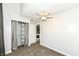 Bedroom with neutral walls, carpet and an open closet leads to the laundry room at 5855 La Fleur Ct, Indianapolis, IN 46237