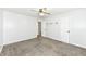 Neutral bedroom has carpet flooring, neutral walls, a ceiling fan and an open closet at 5855 La Fleur Ct, Indianapolis, IN 46237