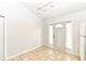 Bright entryway with a white front door, sidelights, tile flooring, and a track light at 5855 La Fleur Ct, Indianapolis, IN 46237