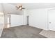A spacious living room featuring neutral tones, vaulted ceilings and transition to tile at 5855 La Fleur Ct, Indianapolis, IN 46237