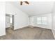 Bright living room featuring vaulted ceilings, neutral walls, and plush carpeting at 5855 La Fleur Ct, Indianapolis, IN 46237