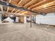 Large basement area with unfinished ceiling, concrete flooring, and visible utilities ready for personalized finishing at 6044 Shallow Crk Ln, Indianapolis, IN 46237