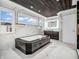 Opulent bathroom featuring a striking black and gold soaking tub and luxury finishes, offering spa experience at 6044 Shallow Crk Ln, Indianapolis, IN 46237