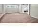 Bright bedroom with carpet floors, neutral tones and adjacent bathroom with a luxurious soaking tub at 6044 Shallow Crk Ln, Indianapolis, IN 46237