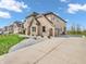 Stunning two-story brick home showcasing a spacious driveway, manicured lawn, and inviting curb appeal in a suburban setting at 6044 Shallow Crk Ln, Indianapolis, IN 46237
