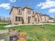 Beautiful two-story home with brick accents and a well-maintained lawn, highlighting curb appeal and landscaping features at 6044 Shallow Crk Ln, Indianapolis, IN 46237