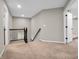 Second floor hallway with railing and natural light that creates an inviting and safe passage at 6044 Shallow Crk Ln, Indianapolis, IN 46237