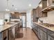 Beautiful kitchen with stainless steel appliances, granite countertops, and ample cabinet space at 6044 Shallow Crk Ln, Indianapolis, IN 46237