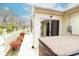 Backyard view featuring a hot tub, slider to the sunroom, and a fenced yard at 6315 Hansbrough Way, Indianapolis, IN 46268