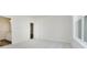 Neutral bedroom with plush carpeting, a bright window, and an ensuite bathroom at 6474 Ambassador Dr, Plainfield, IN 46168