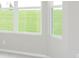 Room with plenty of natural light from the large windows at 6474 Ambassador Dr, Plainfield, IN 46168