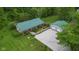 An aerial view showcasing the property with a well-maintained home and a large gravel driveway at 685 N Buffalo Hill Rd, Martinsville, IN 46151