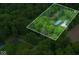 Secluded property nestled amongst mature trees, with a pond and a separate building also on the lot at 685 N Buffalo Hill Rd, Martinsville, IN 46151
