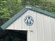 Close-up of a Morton barn featuring the company's logo and the green metal roof at 685 N Buffalo Hill Rd, Martinsville, IN 46151