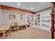 Finished basement includes a built-in bookshelf and a desk space, offering versatility at 685 N Buffalo Hill Rd, Martinsville, IN 46151
