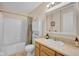 Cozy bathroom featuring a vanity with sink, mirrored medicine cabinet, toilet, and shower-tub combo at 685 N Buffalo Hill Rd, Martinsville, IN 46151